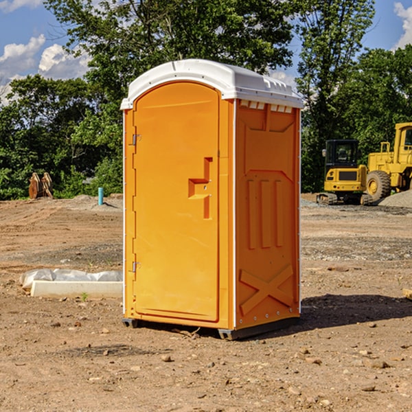 how often are the portable restrooms cleaned and serviced during a rental period in Atkinson Mills